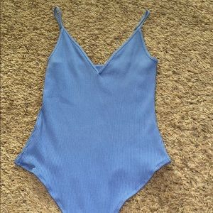 Blue body suit